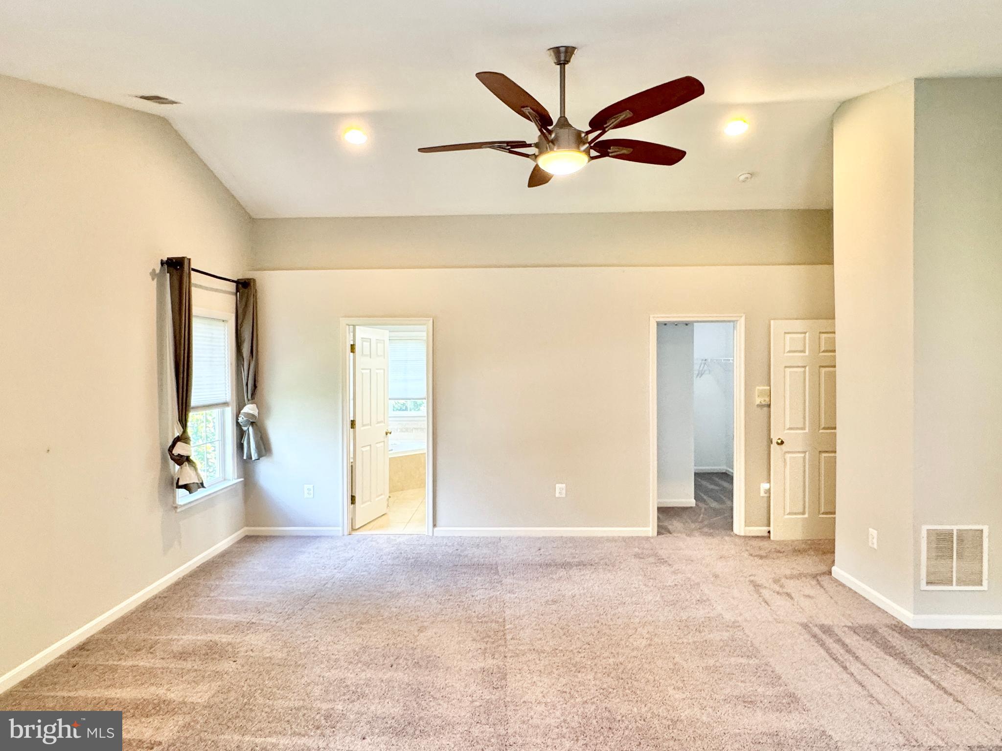 3721 Katie Place Triangle, VA 22172 - Photo 16 of 39 a view of a livingroom with a ceiling fan and window