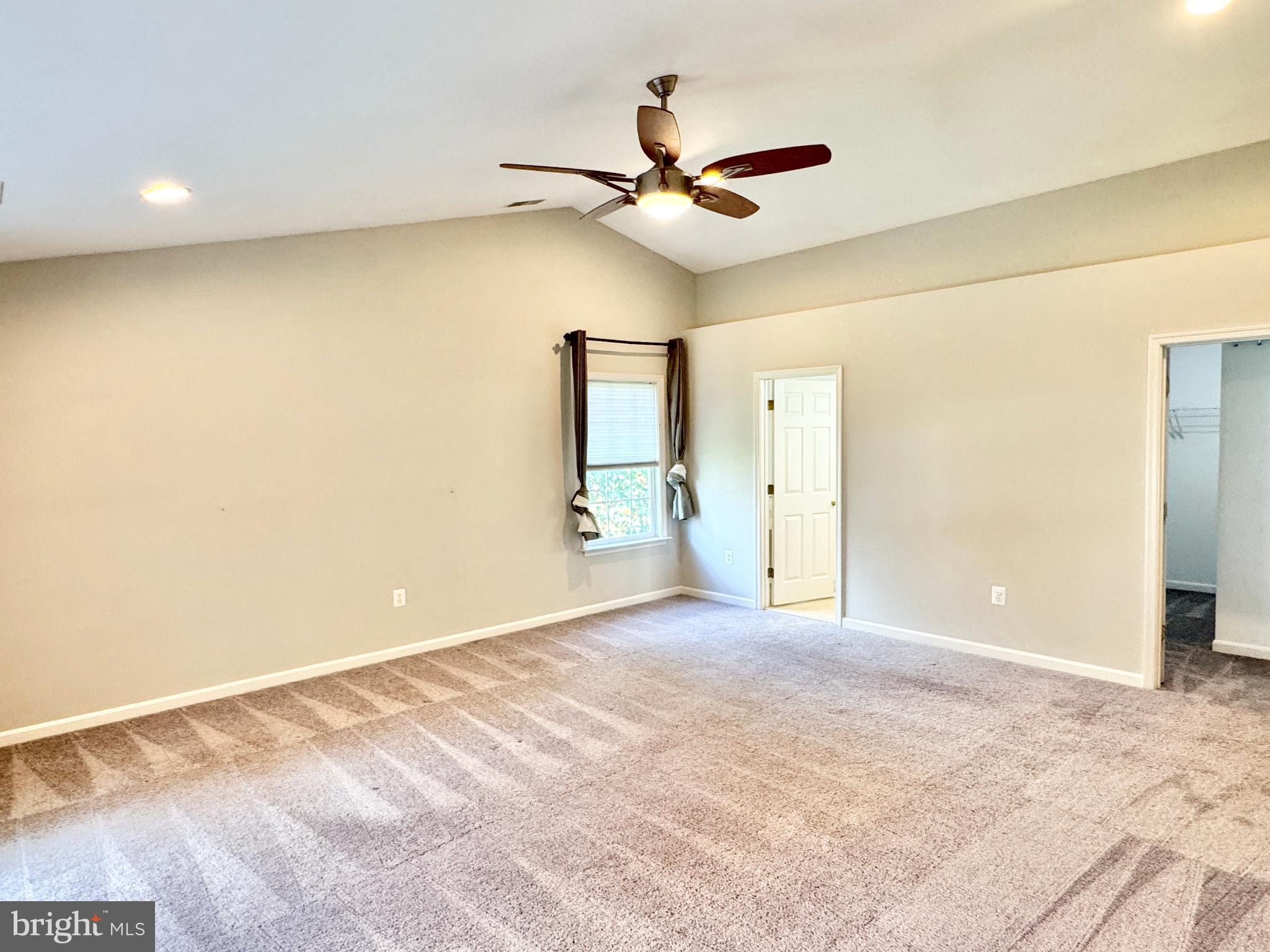 3721 Katie Place Triangle, VA 22172 - Photo 17 of 39 a view of a livingroom with a ceiling fan and window