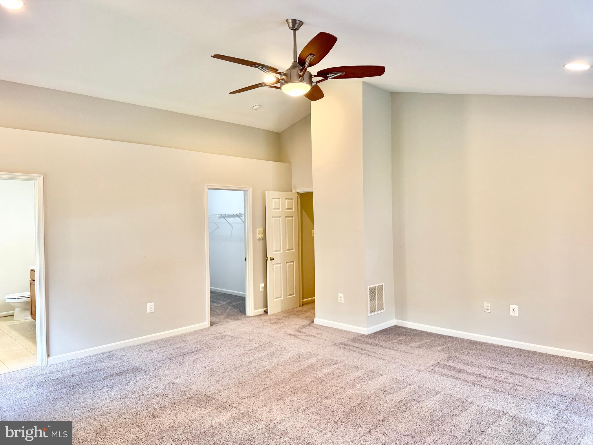 3721 Katie Place Triangle, VA 22172 - Photo 18 of 39 a view of a livingroom with a ceiling fan and window