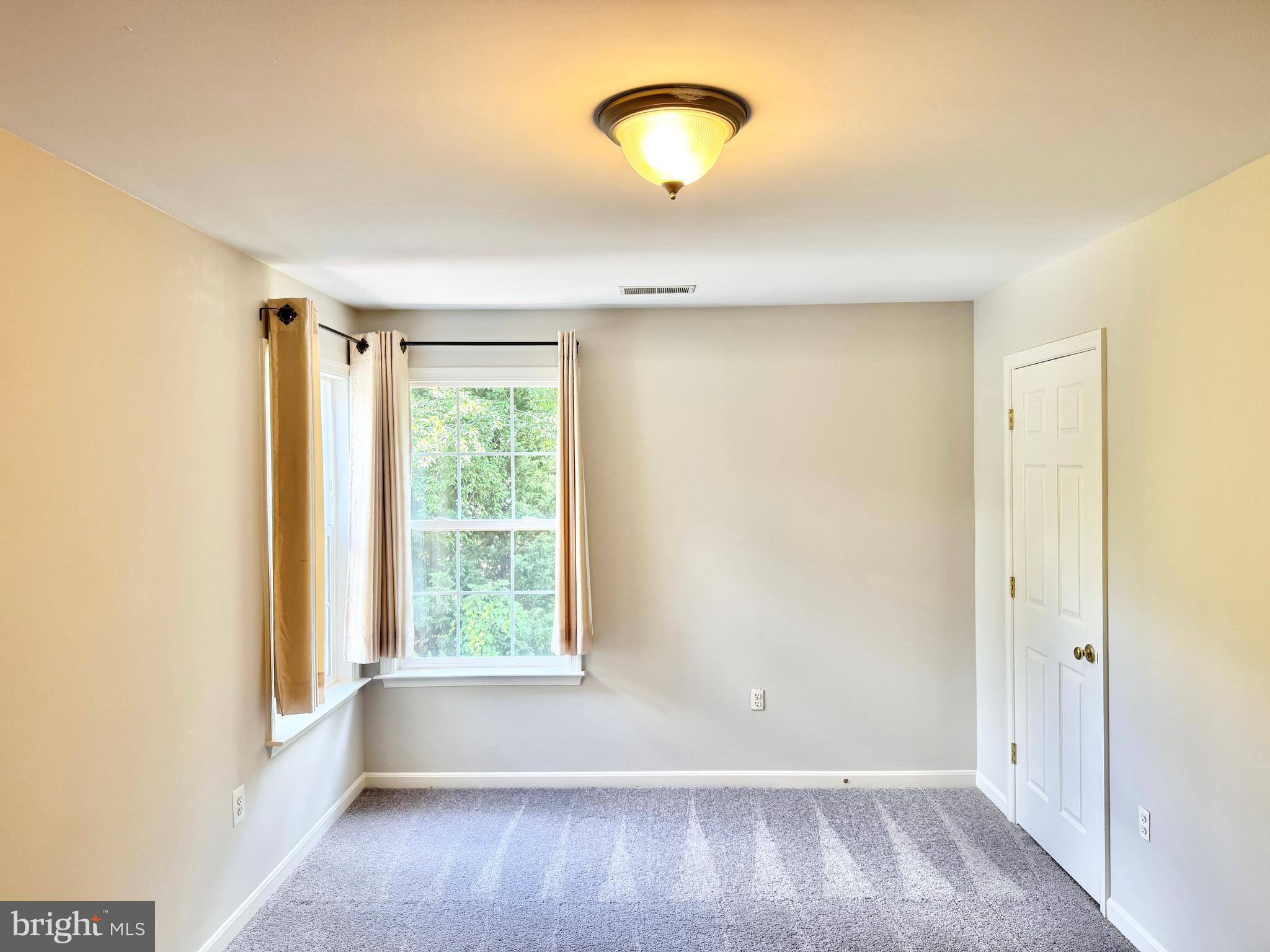 3721 Katie Place Triangle, VA 22172 - Photo 22 of 39 a view of room with window and hardwood floor