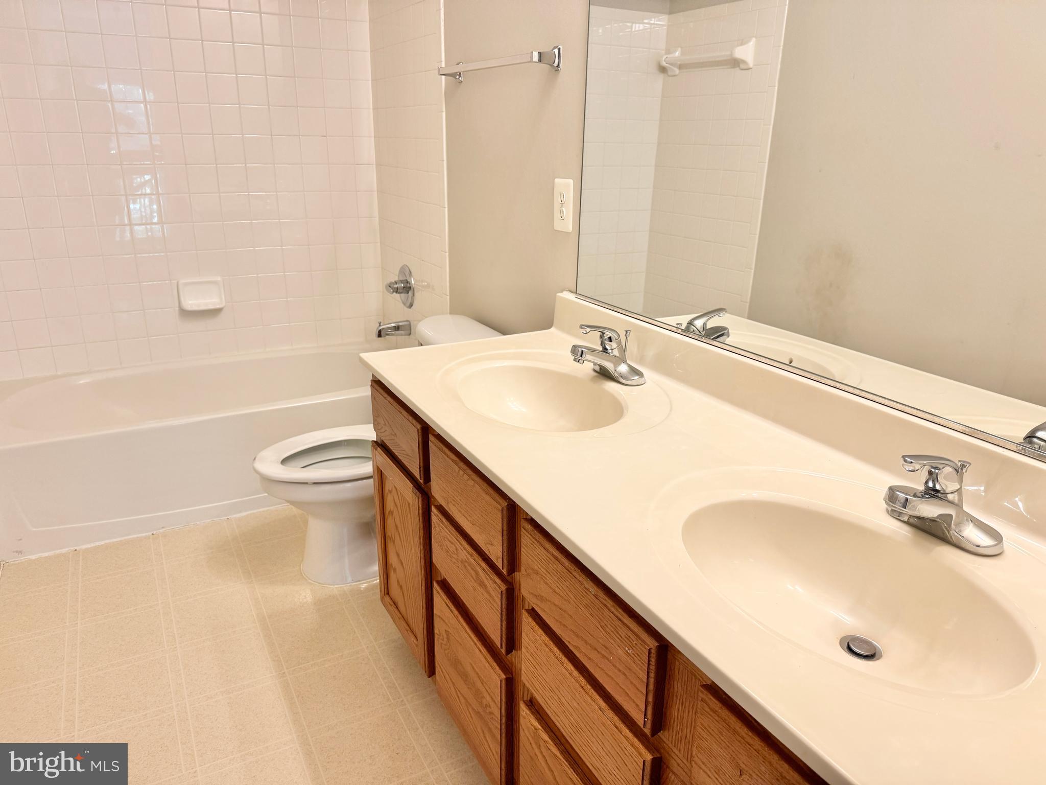 3721 Katie Place Triangle, VA 22172 - Photo 24 of 39 a bathroom with a sink a toilet and bathtub