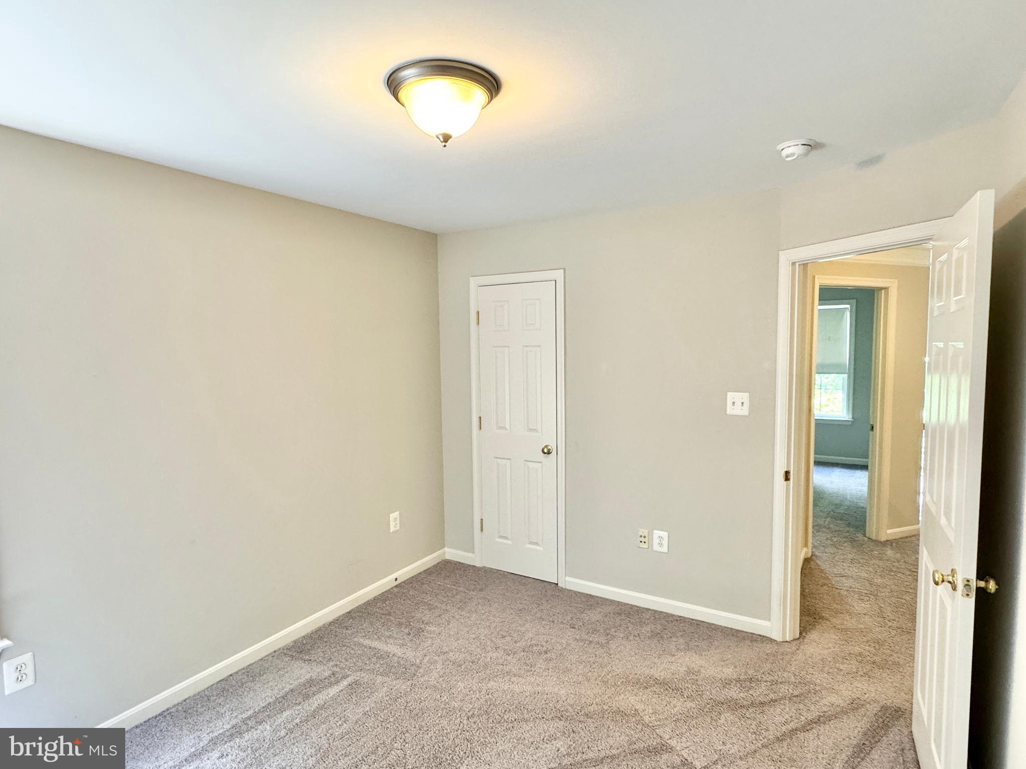 3721 Katie Place Triangle, VA 22172 - Photo 26 of 39 an empty room with a mirror and a sink