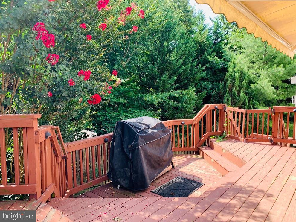3721 Katie Place Triangle, VA 22172 - Photo 35 of 39 a view of a wooden chairs and bench in the patio