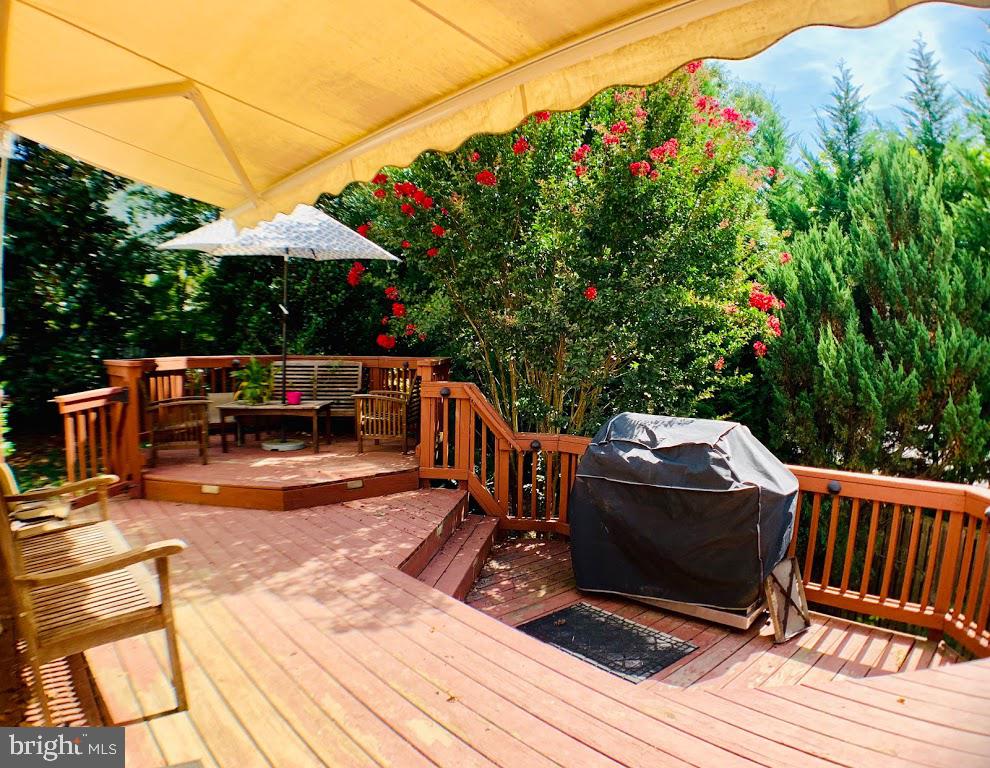 3721 Katie Place Triangle, VA 22172 - Photo 36 of 39 a view of balcony with wooden floor and outdoor seating