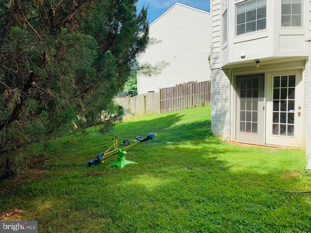 3721 Katie Place Triangle, VA 22172 - Photo 39 of 39 a view of an house with backyard space and garden
