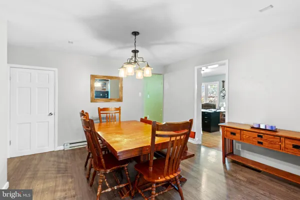 a view of a dining room with furniture