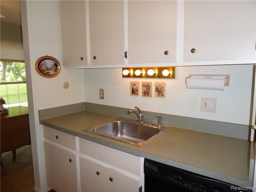 1199 South Sheldon Road, Unit L86 Plymouth, MI 48170 - Photo 12 of 38 Updated Kitchen Stainless Sink
