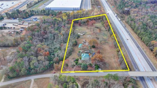 a view of swimming pool with a yard