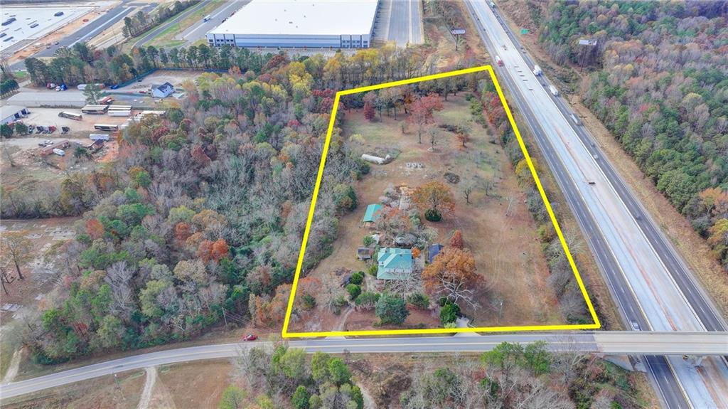 a view of swimming pool with a yard