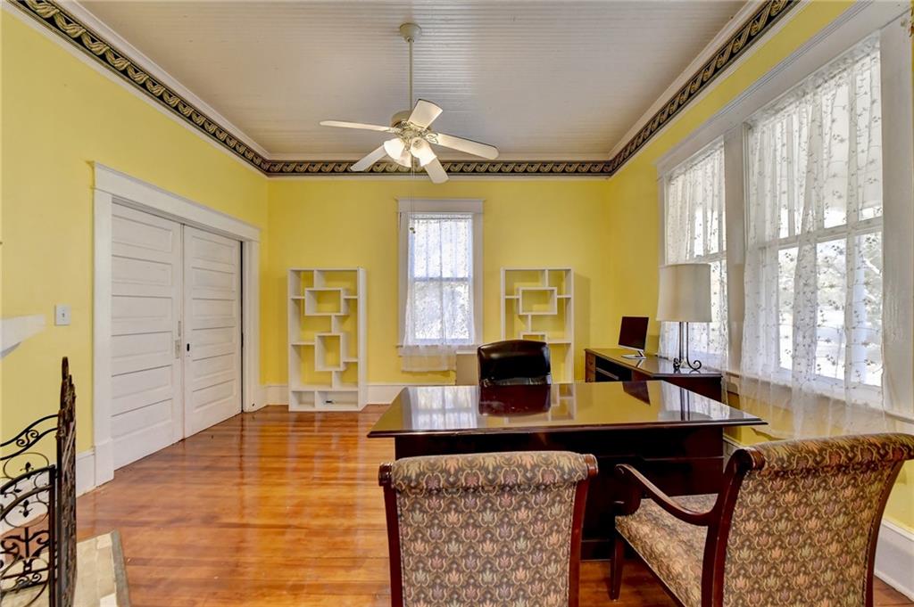 221 Plainview Road Jefferson, GA 30549 - Photo 16 of 87 a view of a dining room with furniture and a chandelier