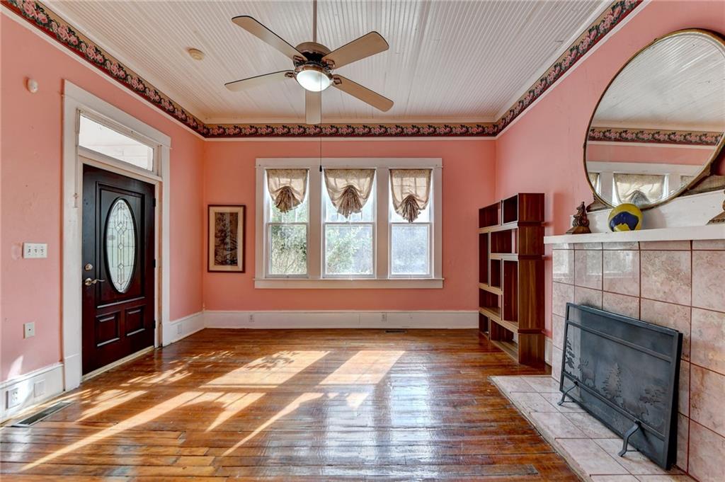 221 Plainview Road Jefferson, GA 30549 - Photo 21 of 87 a view of livingroom with furniture hardwood floor and a ceiling fan