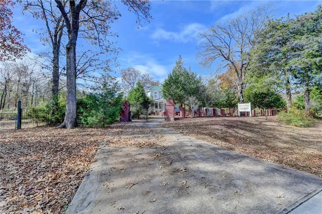 a view of a car park in front of house