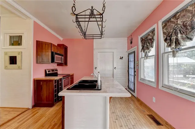 a bedroom with a bed and a table