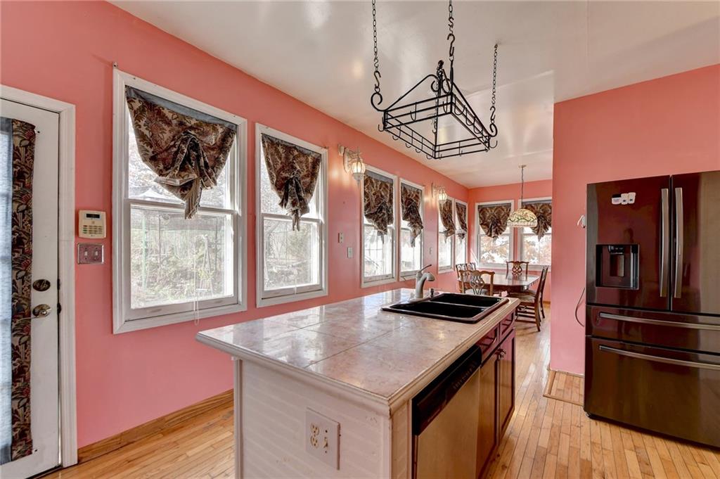 221 Plainview Road Jefferson, GA 30549 - Photo 38 of 87 a kitchen with stainless steel appliances granite countertop a stove and a refrigerator