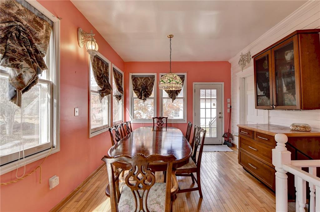 221 Plainview Road Jefferson, GA 30549 - Photo 40 of 87 a view of a dining room with furniture window and wooden floor