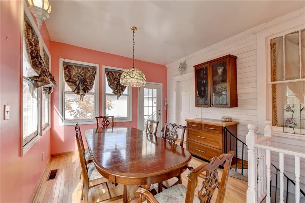 221 Plainview Road Jefferson, GA 30549 - Photo 41 of 87 a dining room with furniture window and wooden floor