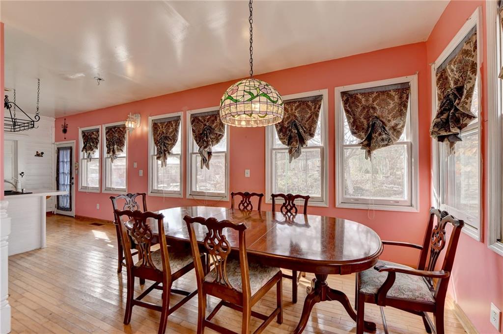 221 Plainview Road Jefferson, GA 30549 - Photo 42 of 87 a dining room with furniture a chandelier and window