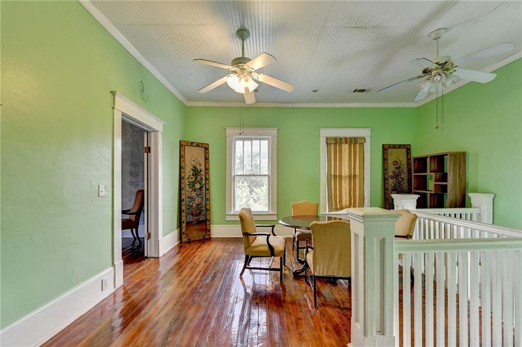 221 Plainview Road Jefferson, GA 30549 - Photo 44 of 87 a view of a dining room with furniture and wooden floor