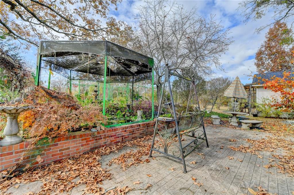 221 Plainview Road Jefferson, GA 30549 - Photo 64 of 87 a view of patio with table and chairs and potted plants