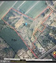 an aerial view of a city with lots of residential buildings