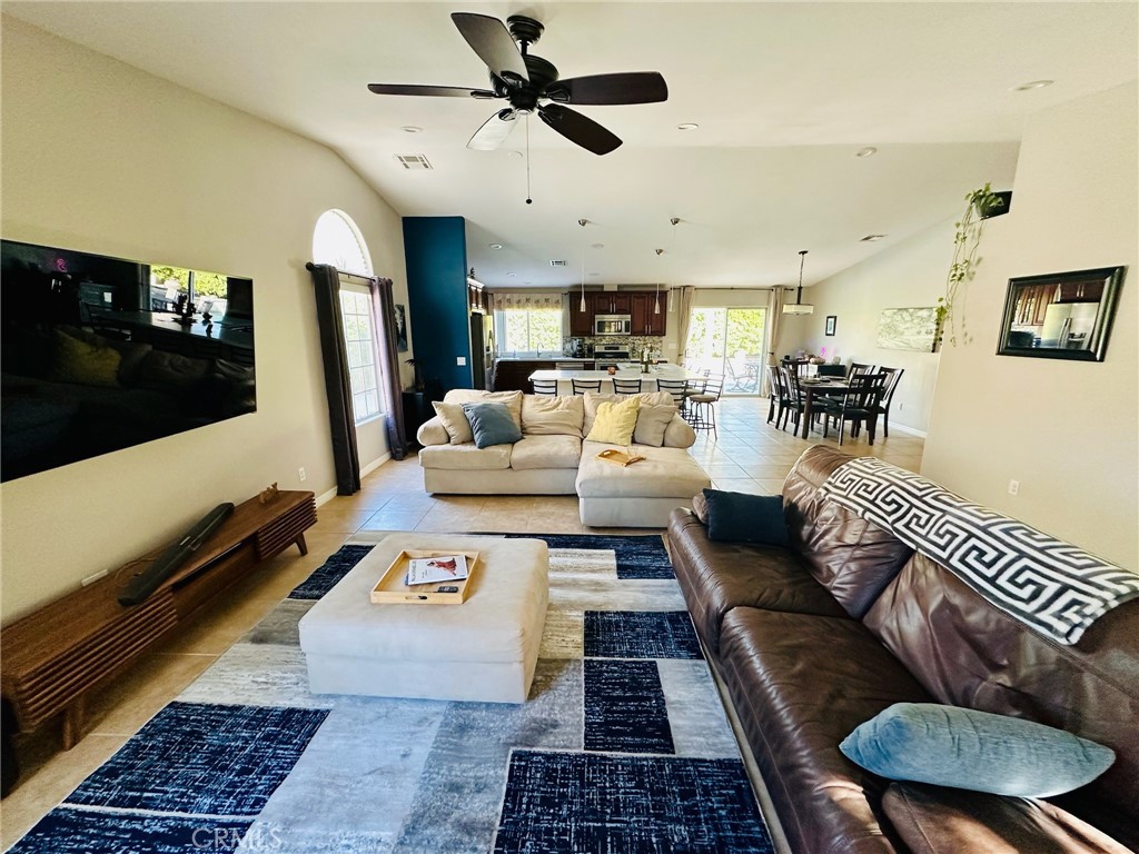67810 Ontina Road Cathedral City, CA 92234 - Photo 11 of 43 a living room with furniture and a rug