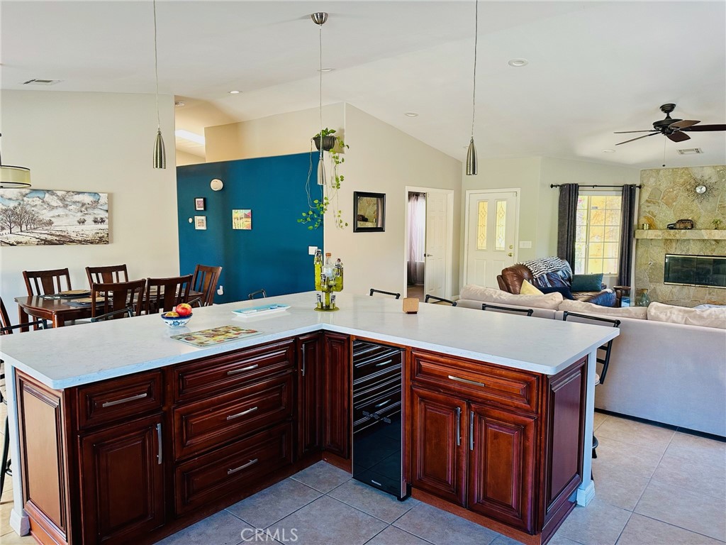 67810 Ontina Road Cathedral City, CA 92234 - Photo 12 of 43 a kitchen with a sink and a stove top oven