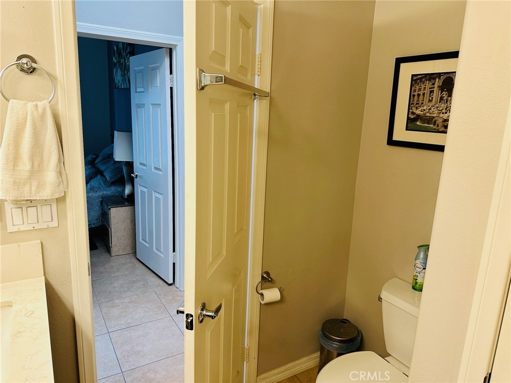 67810 Ontina Road Cathedral City, CA 92234 - Photo 31 of 43 a bathroom with a toilet and a shower