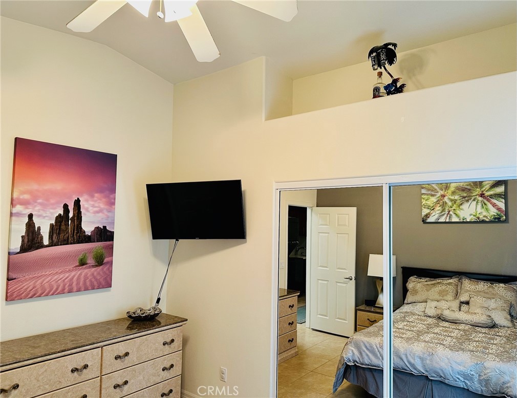 67810 Ontina Road Cathedral City, CA 92234 - Photo 34 of 43 a living room with furniture and a flat screen tv