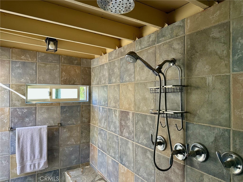 67810 Ontina Road Cathedral City, CA 92234 - Photo 40 of 43 a bathroom with a shower