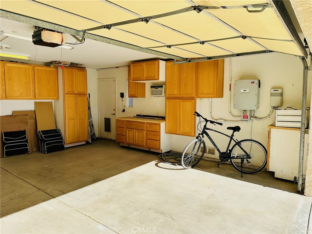 67810 Ontina Road Cathedral City, CA 92234 - Photo 42 of 43 a view of a indoor garage