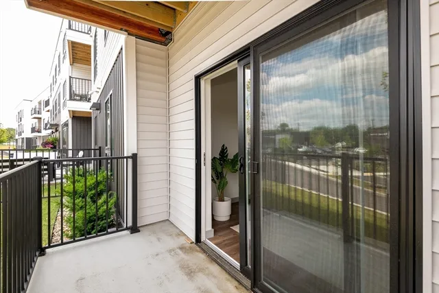 a porch with a glass door