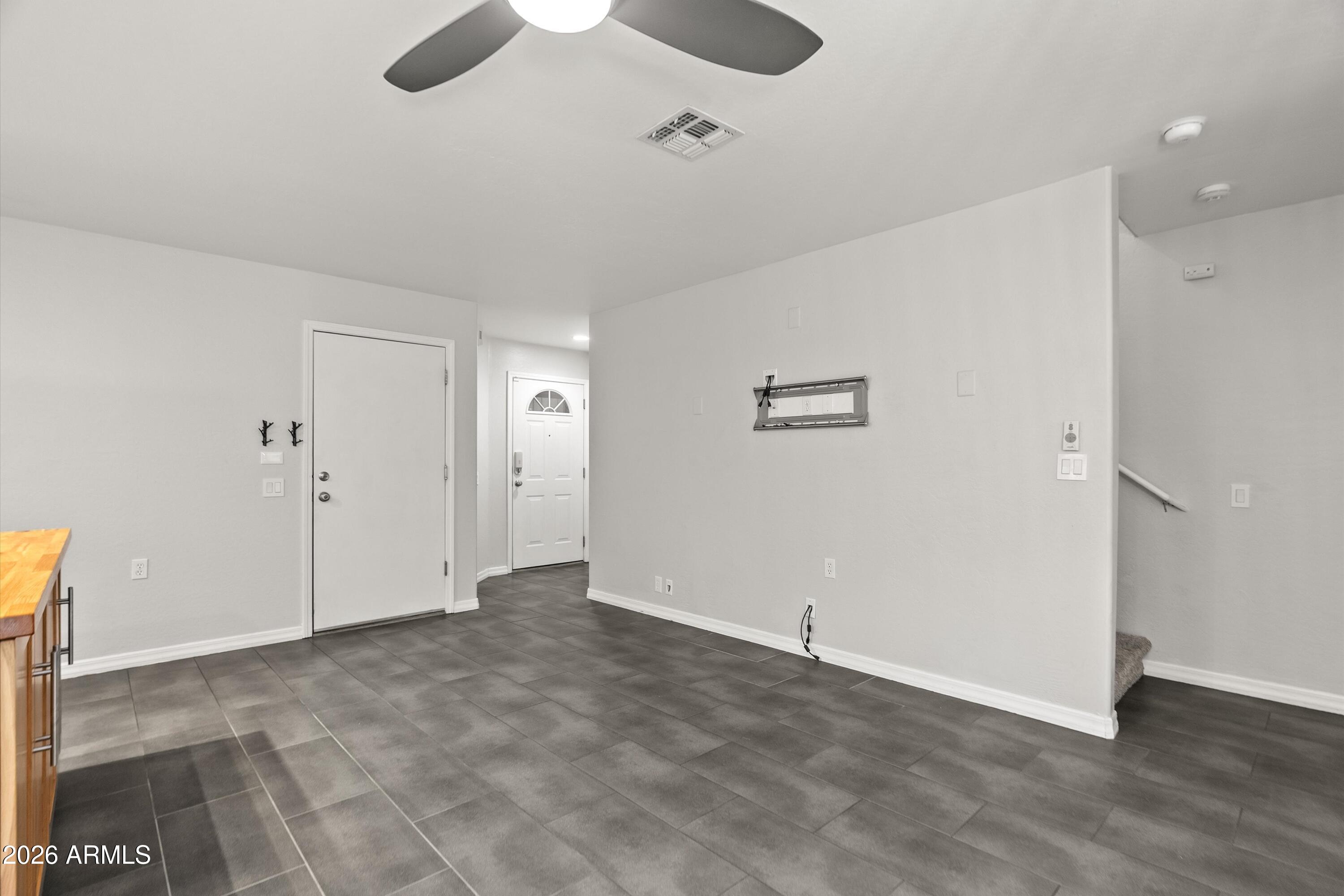 15649 North 29th Place Phoenix, AZ 85032 - Photo 13 of 35 wooden floor in an empty room