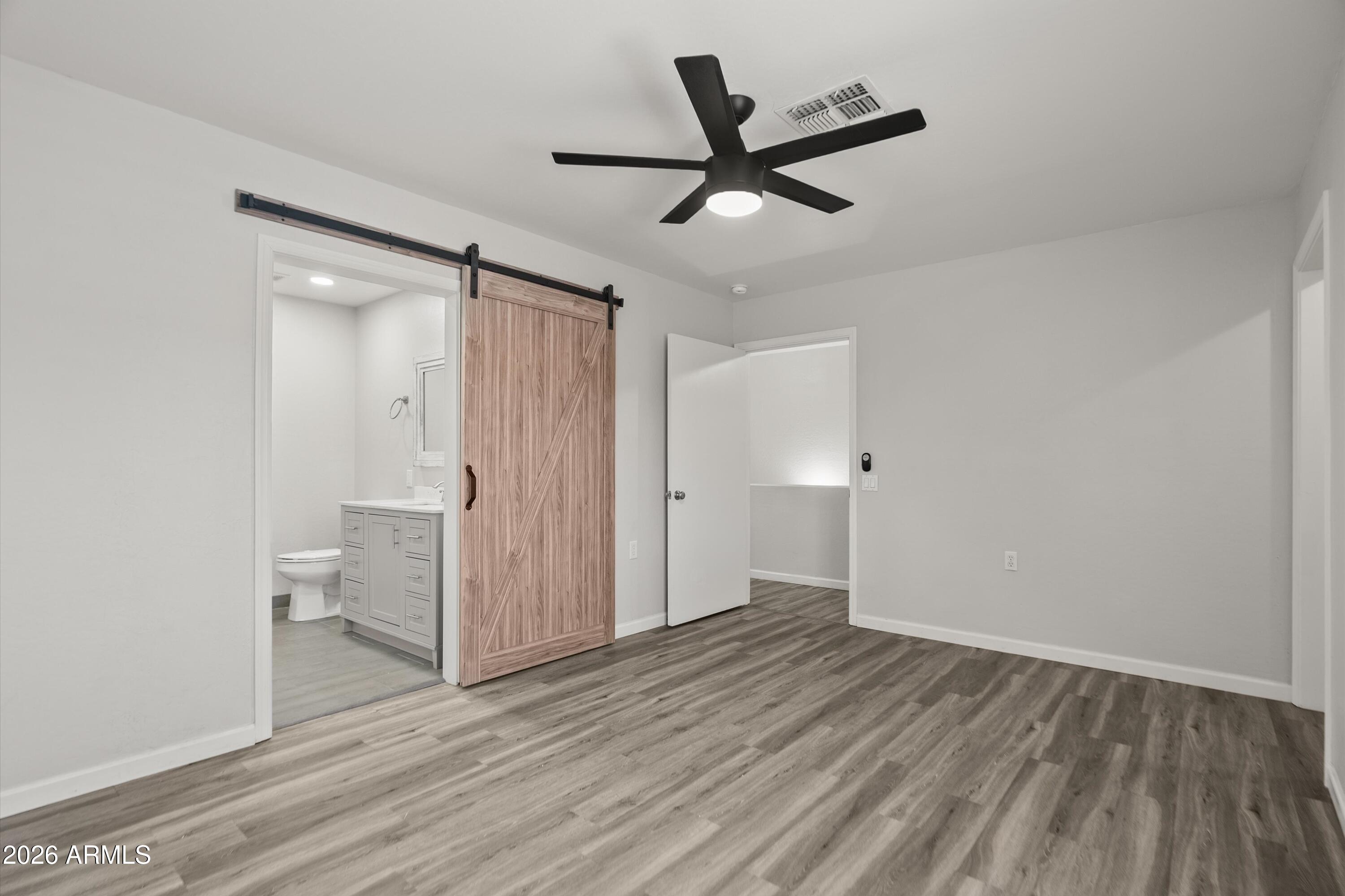 15649 North 29th Place Phoenix, AZ 85032 - Photo 20 of 35 wooden floor in an empty room