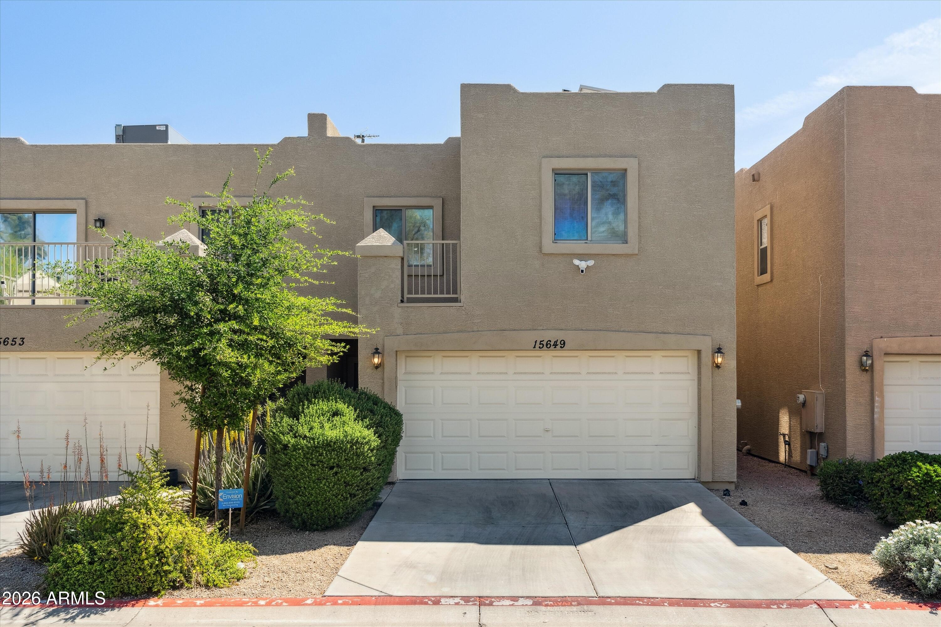 15649 North 29th Place Phoenix, AZ 85032 - Photo 2 of 35 a view of a house with a yard
