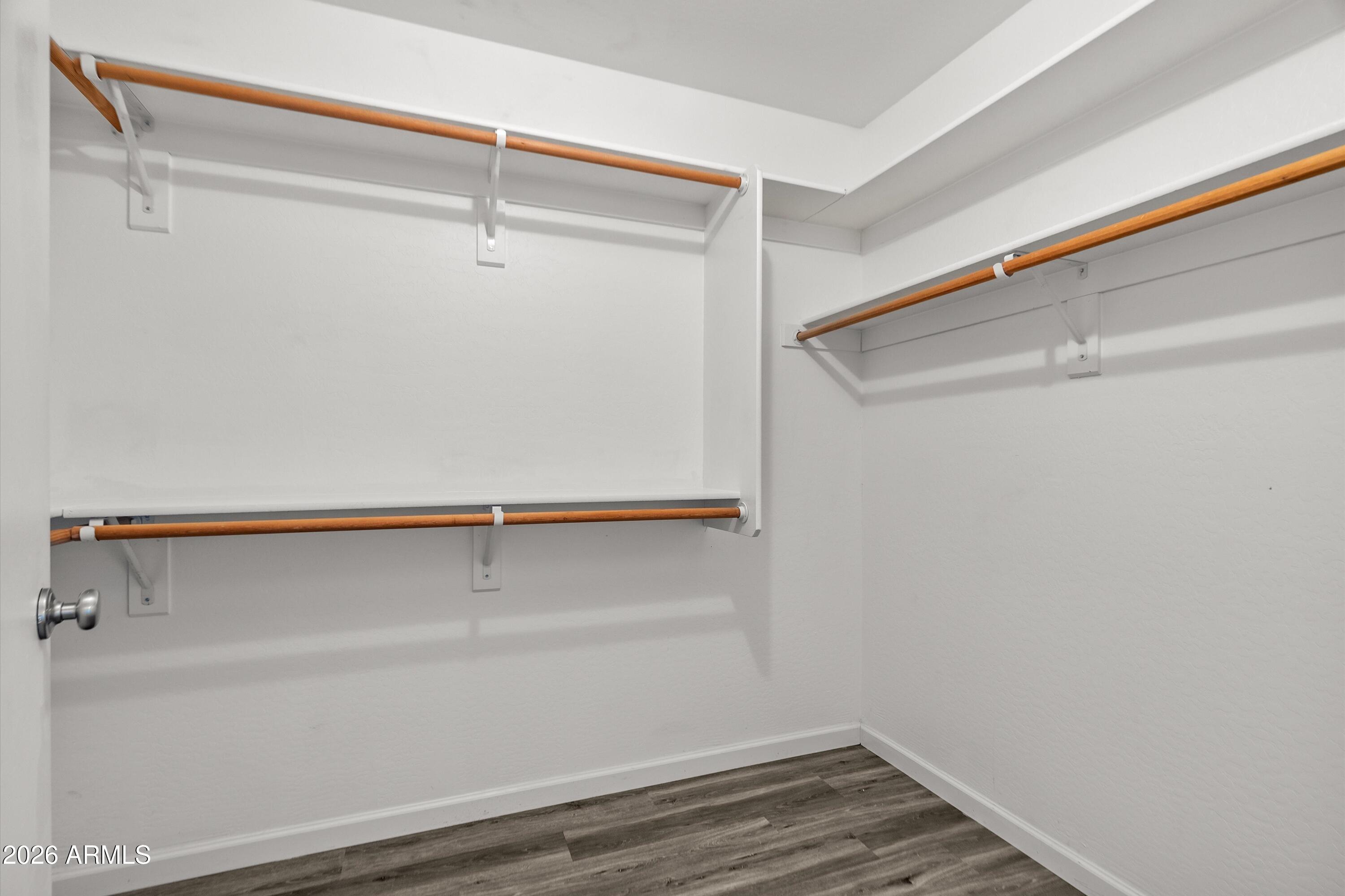 15649 North 29th Place Phoenix, AZ 85032 - Photo 23 of 35 a view of an empty walk in closet
