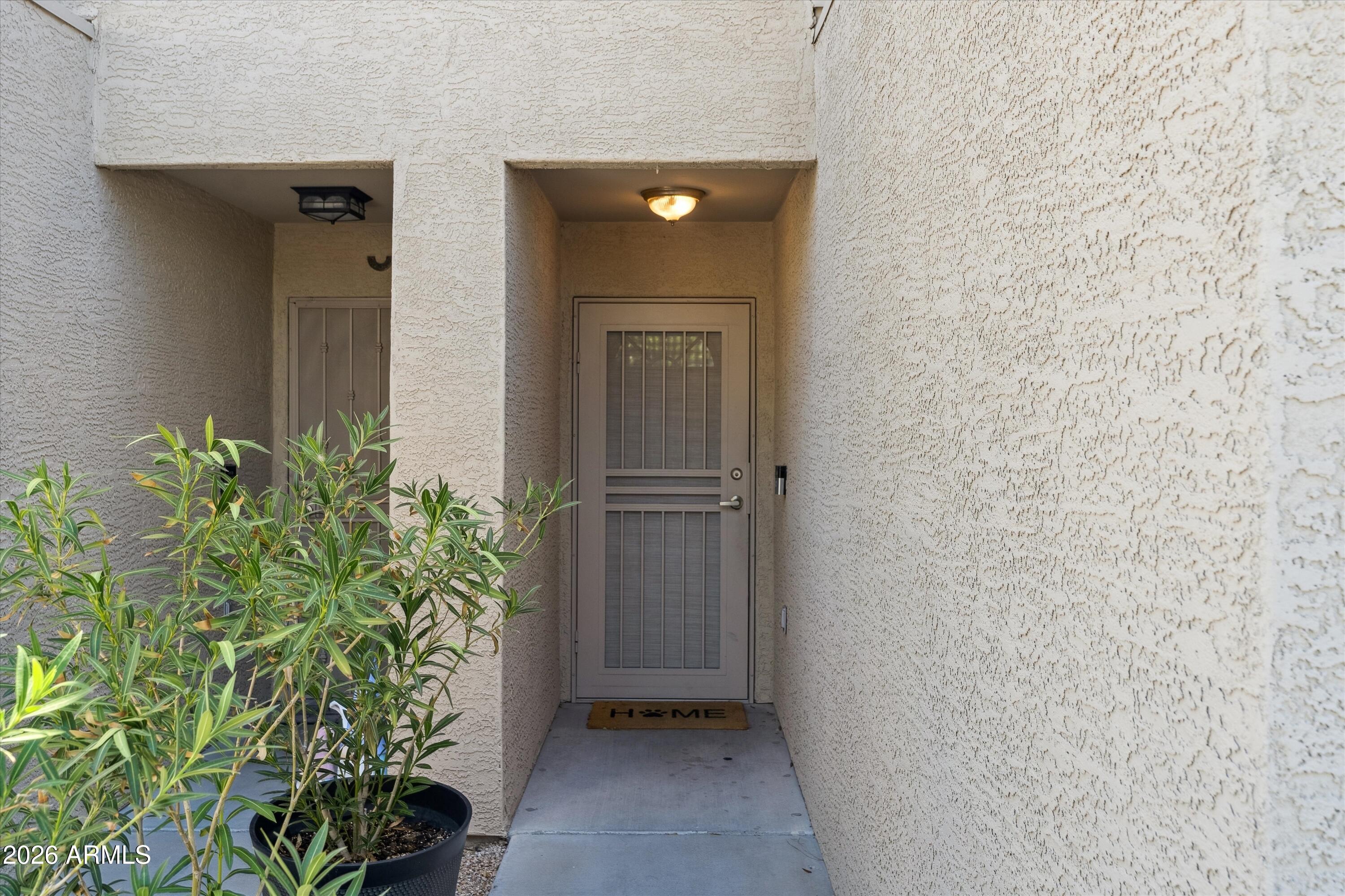 15649 North 29th Place Phoenix, AZ 85032 - Photo 33 of 35 a view of entryway with livingroom