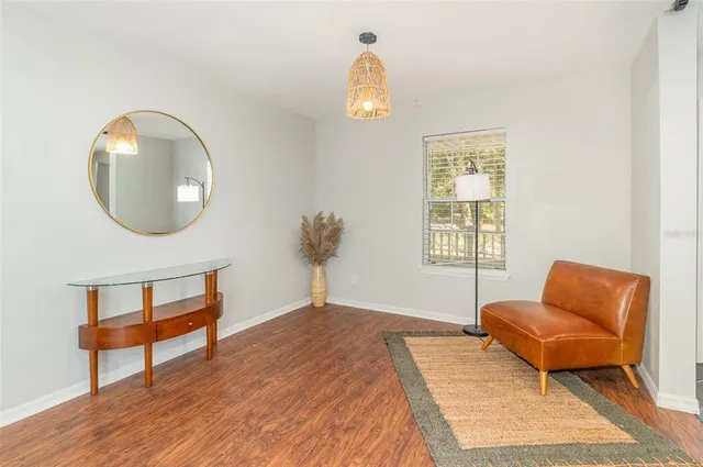 a bedroom with bed and a window