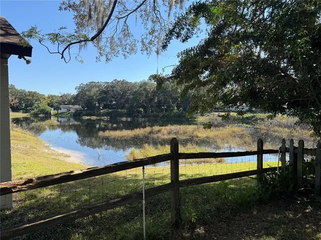 a view of a lake from a yard