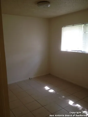 an empty room with a window