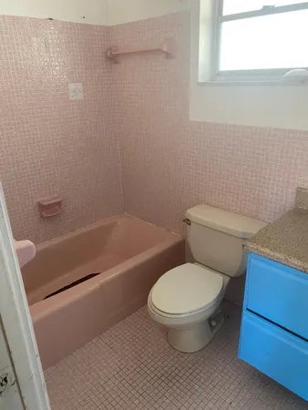 a bathroom with a sink and a toilet