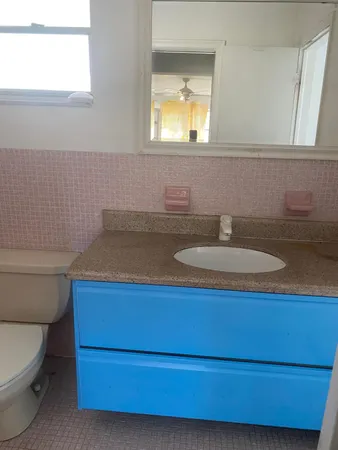 a room with furniture and window