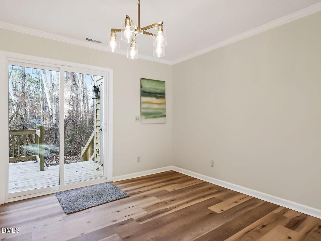 3204 Coachman's Way Durham, NC 27705 - Photo 9 of 27 a view of a room with wooden floor and windows