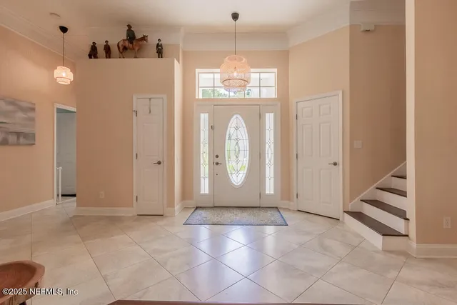 a kitchen with stainless steel appliances granite countertop a stove top oven and cabinets