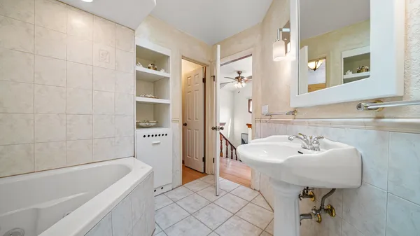 a bathroom with a sink and a bathtub