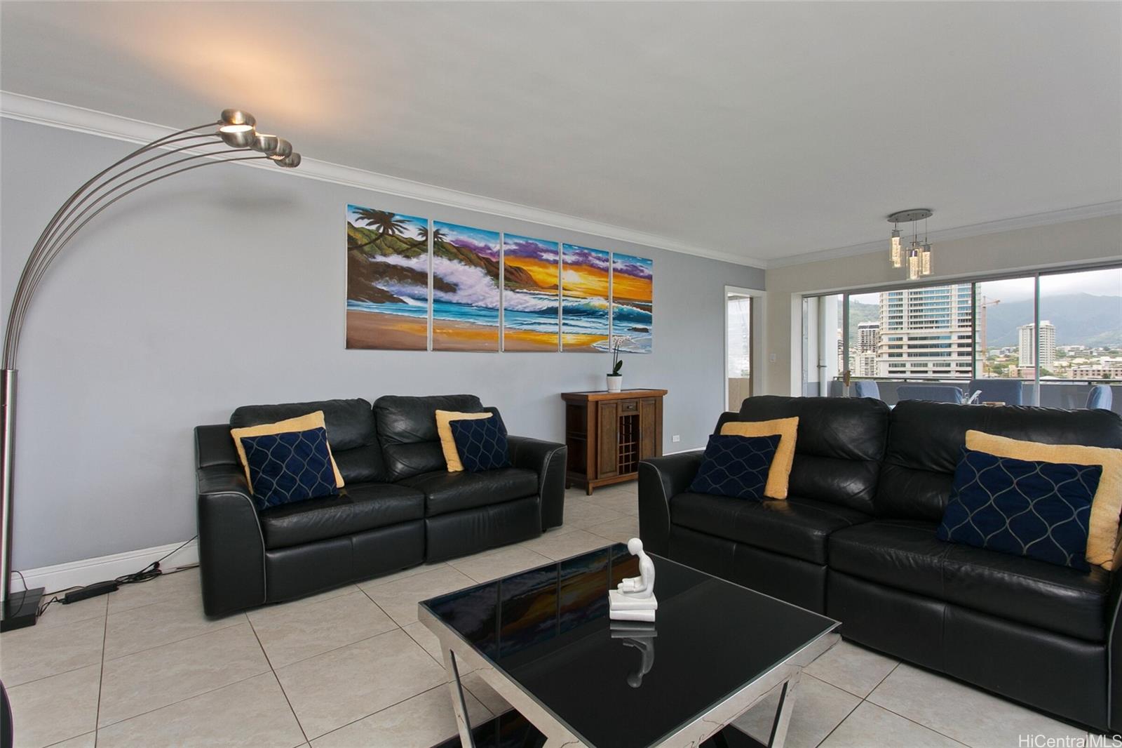 2015 Ala Wai Boulevard, Unit 8A Honolulu, HI 96815 - Photo 3 of 18 a living room with furniture and a wooden floor
