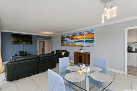 a living room with fireplace furniture and a flat screen tv
