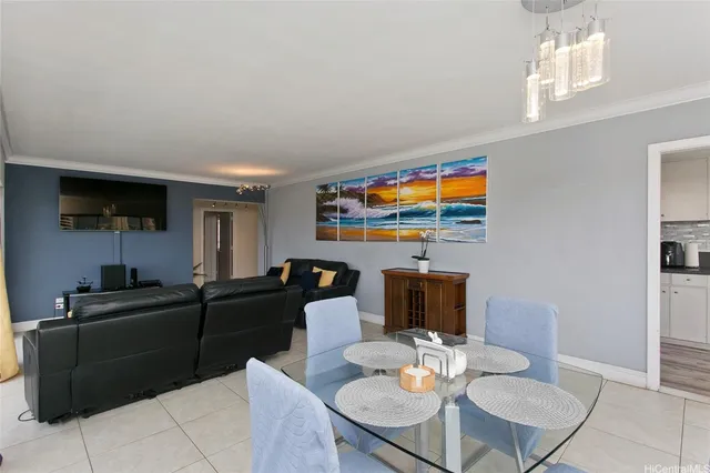 a living room with fireplace furniture and a flat screen tv