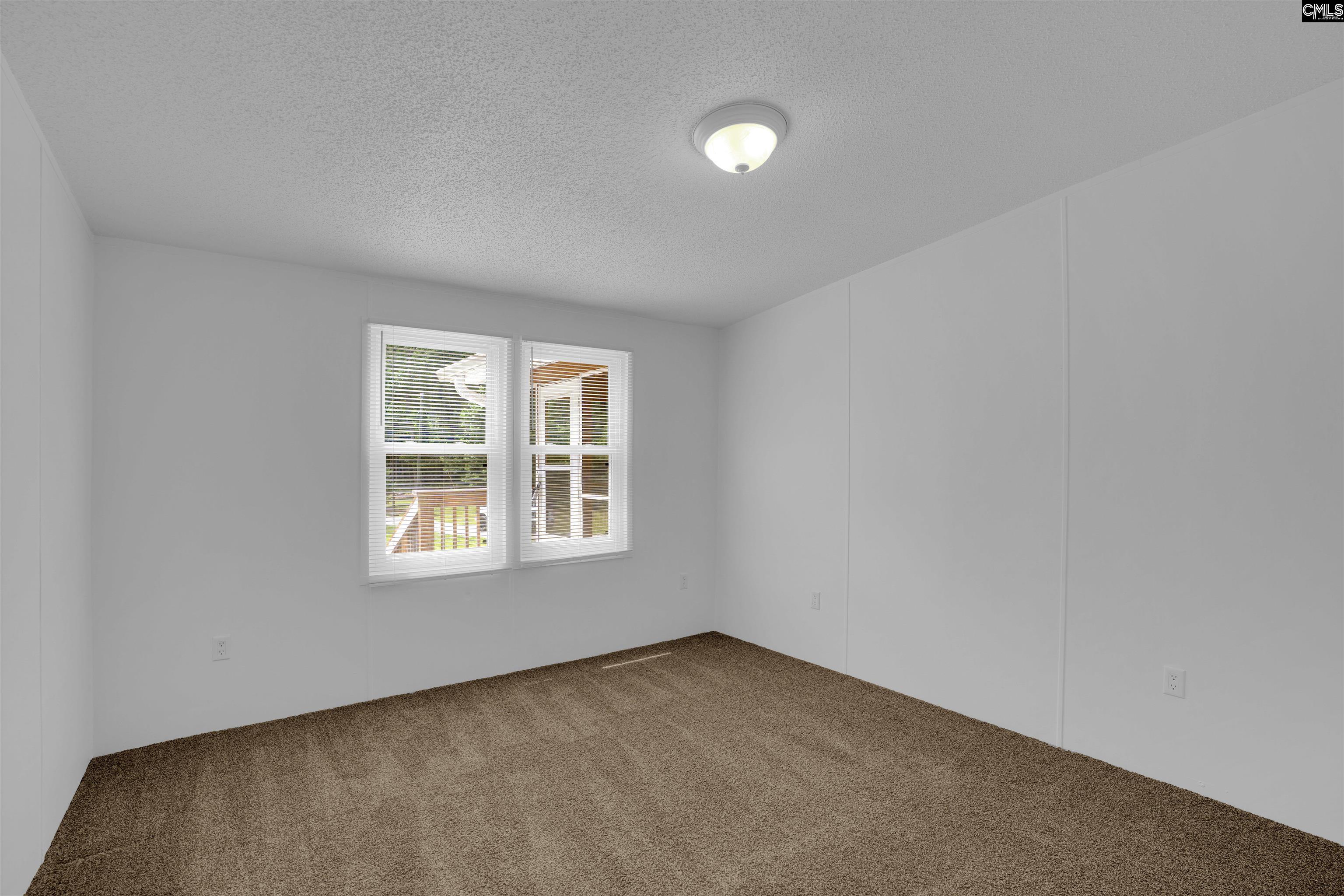 304 Cooper Road Blythewood, SC 29016 - Photo 18 of 29 an empty room with a window