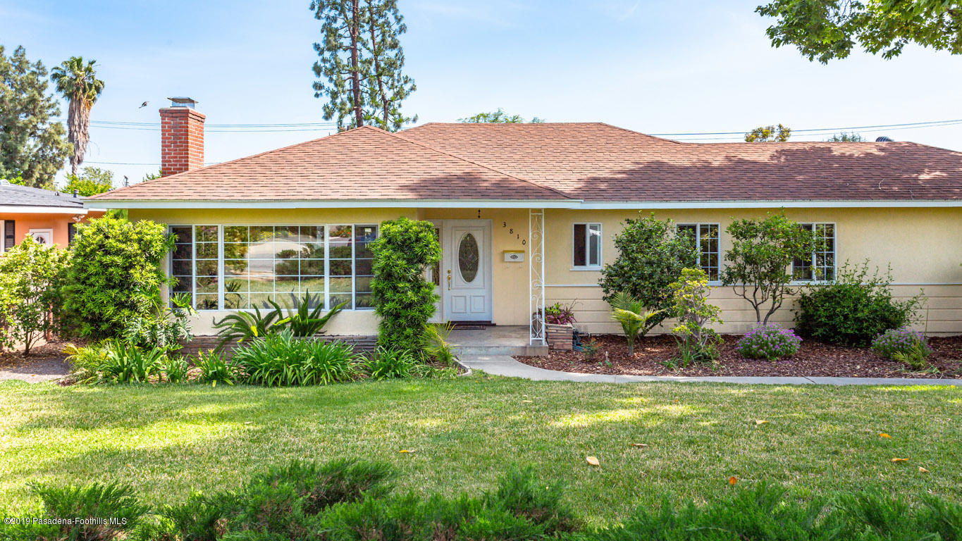 3810 Fairmeade Road Pasadena, CA 91107 - Photo 2 of 47 a view of a house with a yard and a table