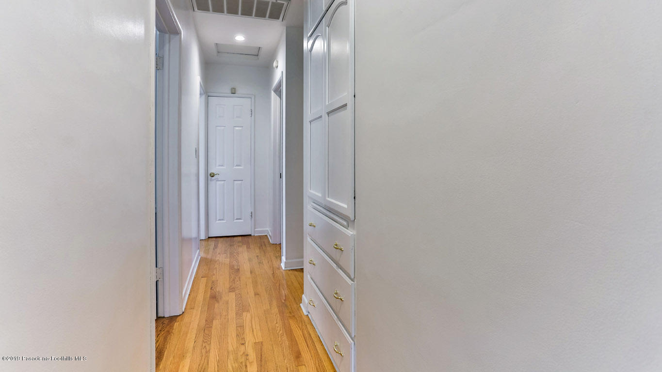 3810 Fairmeade Road Pasadena, CA 91107 - Photo 19 of 47 a view of a hallway with wooden floor